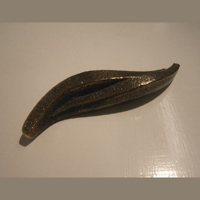 RW549B, Hingabe, liegend, Bronze, L14 cm